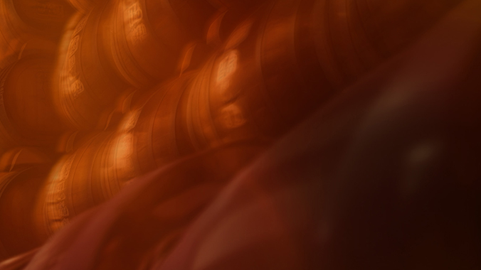 Blurred barrels stacked horizontally