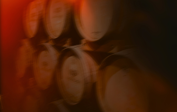 Unfocused barrels stacked with red tint