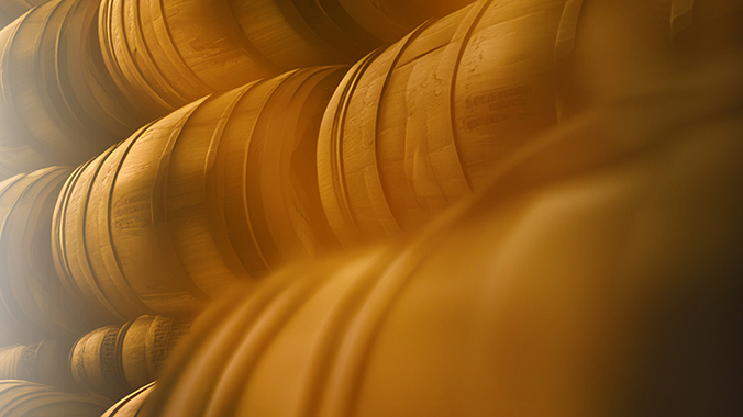 Barrels stacked horizontally with yellow tint
