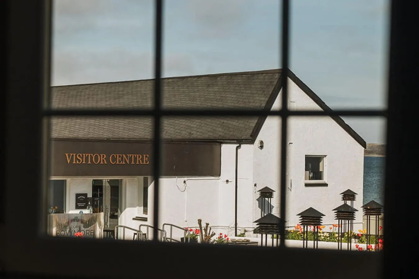 Bowmore visitor centre viewed from inside cottages.