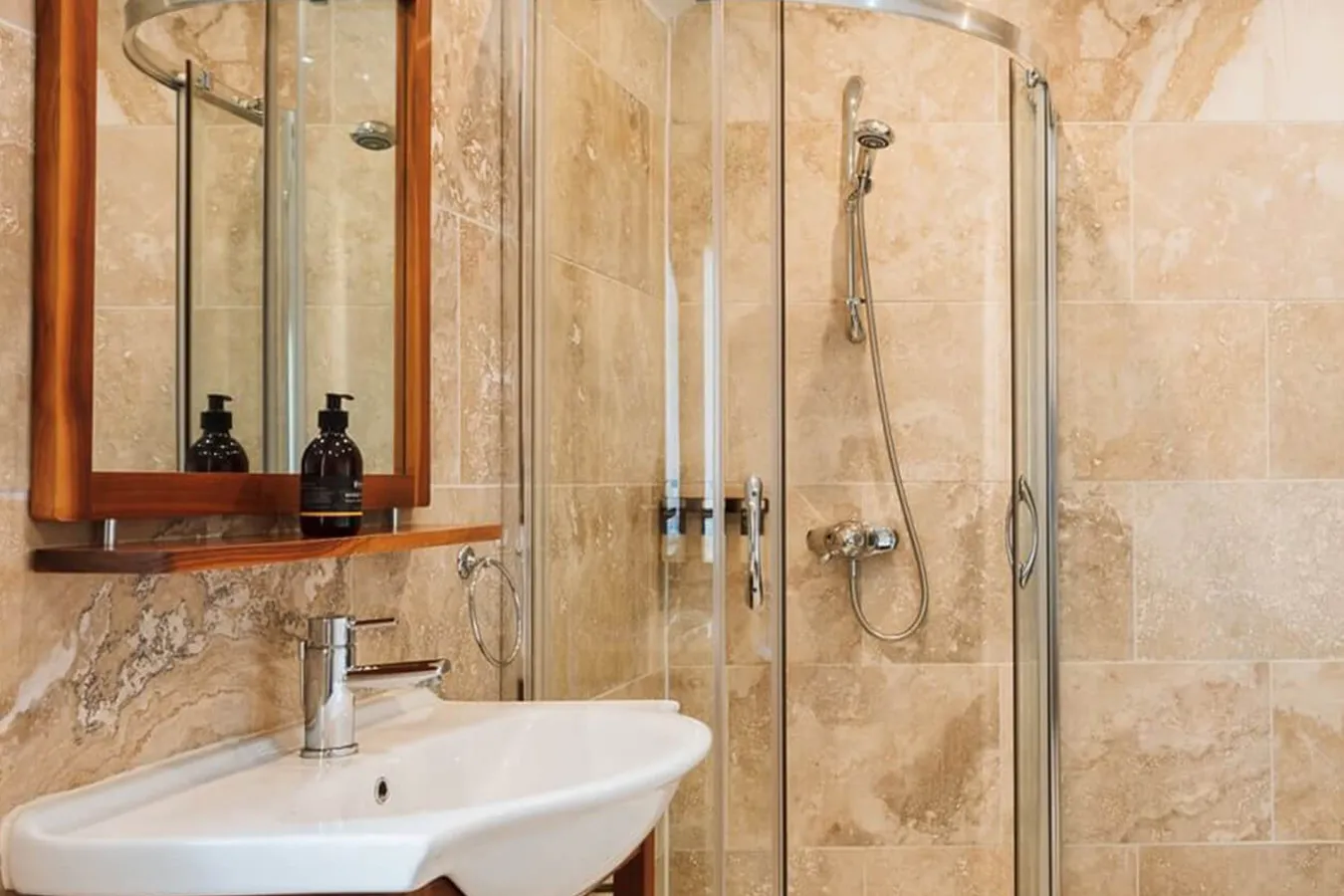  Bowmore cottage bathroom shot of sink unit and mirror with highland soap gel