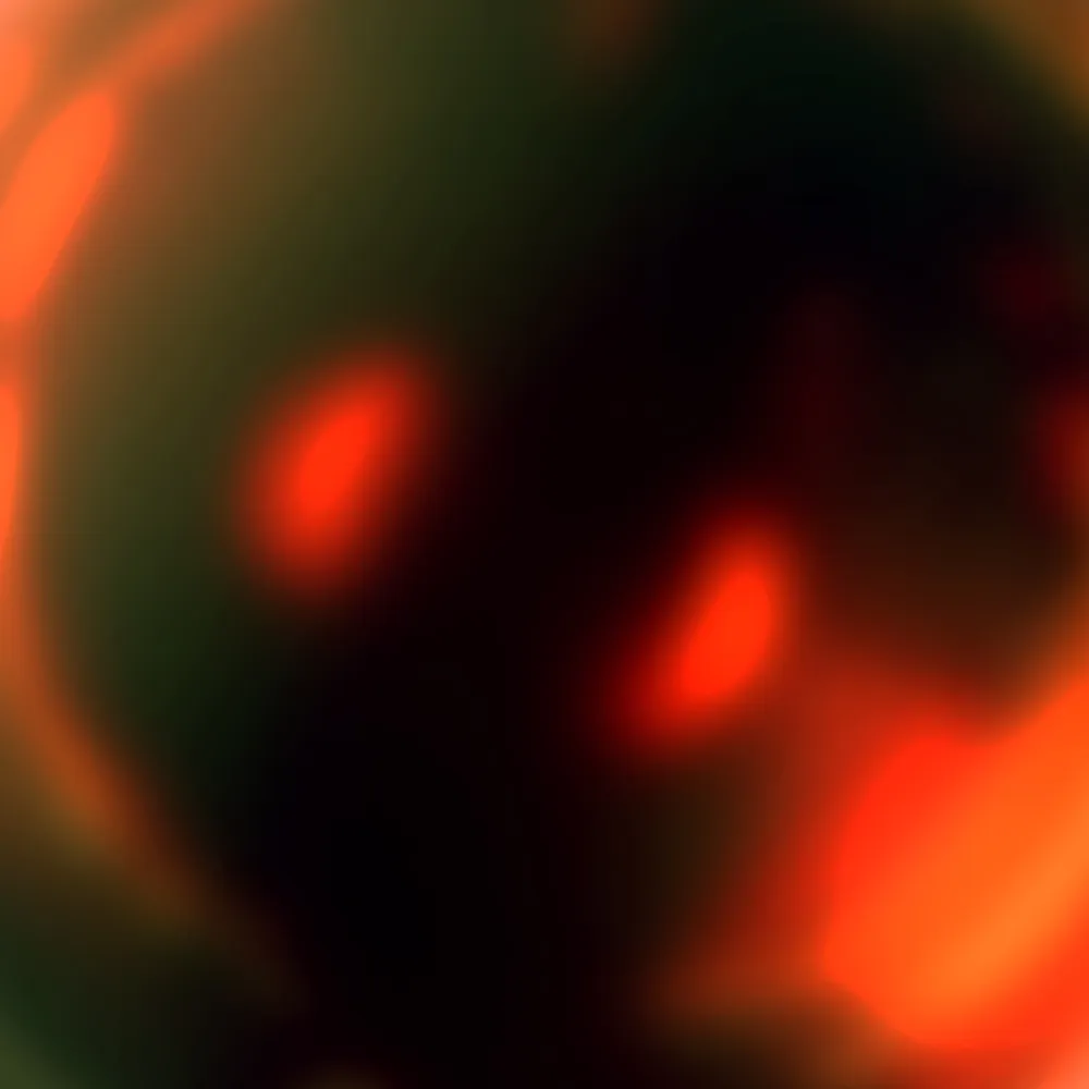 An intense mix of dark and fiery red hues resembling cinders