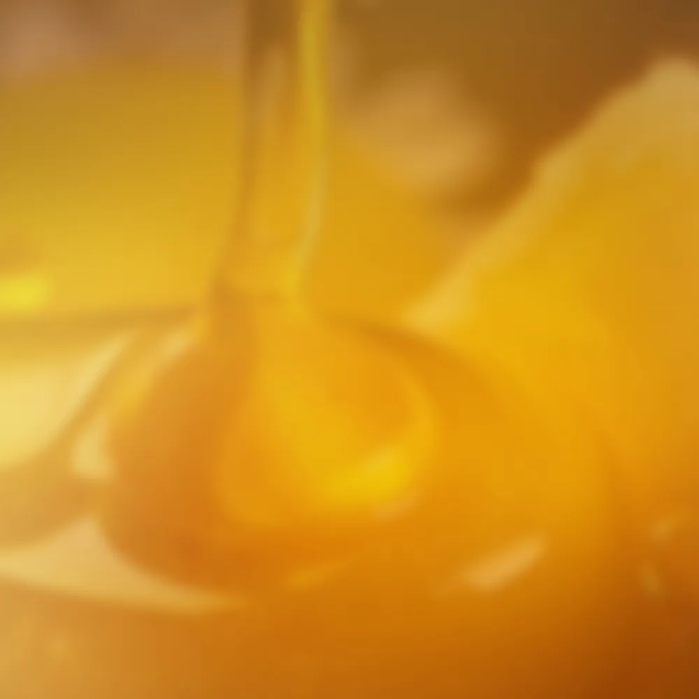 Dripping liquid with warm golden tones