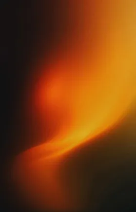 A blurred texture with brown and golden tones.