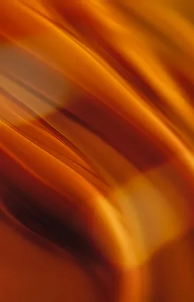 A liquid swirl of caramel tones 