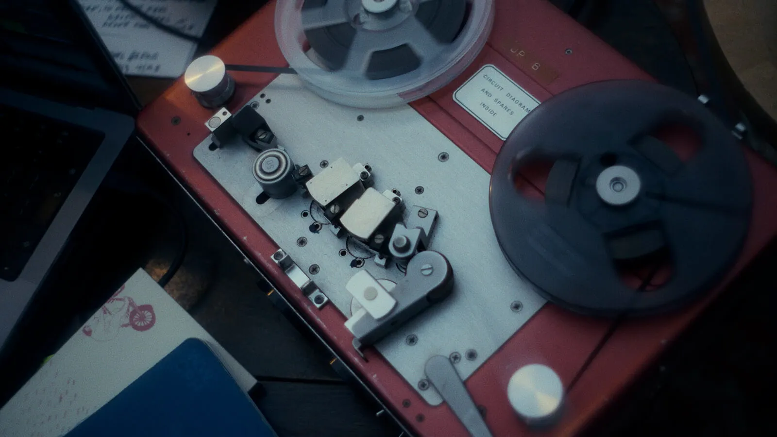 Old red audio tape recorder.