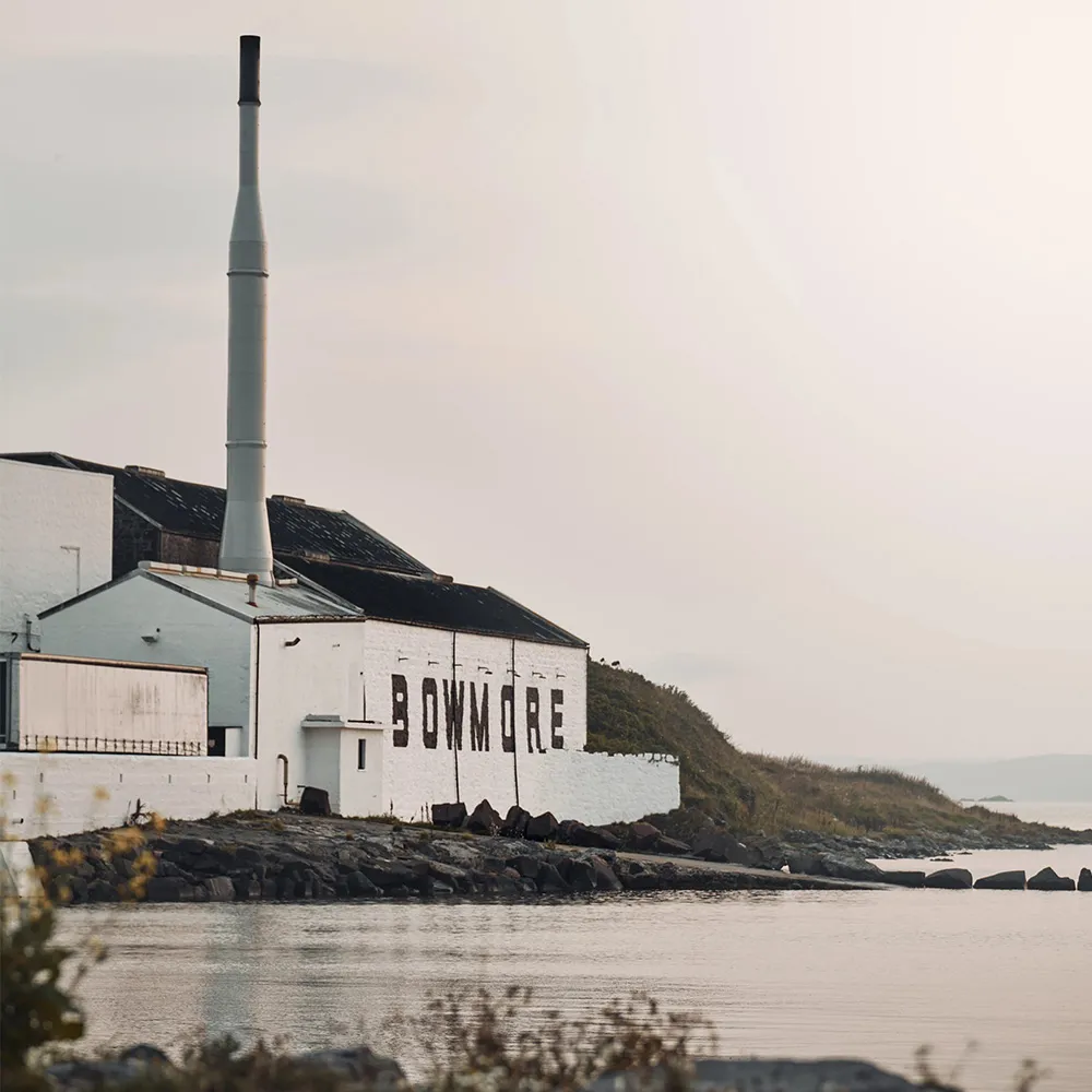 Exterior of No1 Vault with loch in foreground.