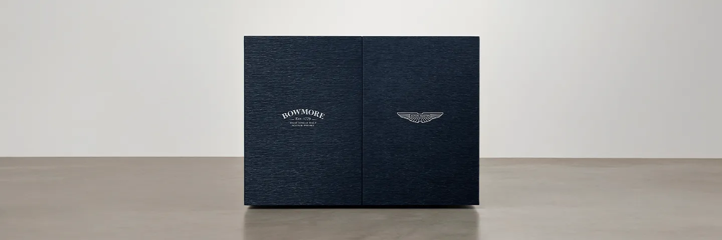 Navy blue box with Bowmore and Aston Martin brand logos