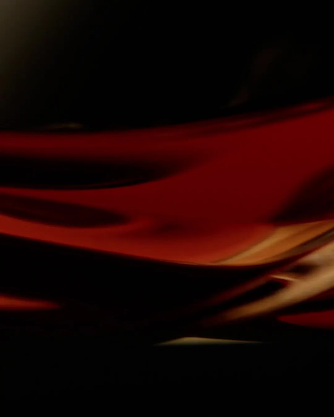 Swirling ripples of colour with the copy Coming Soon