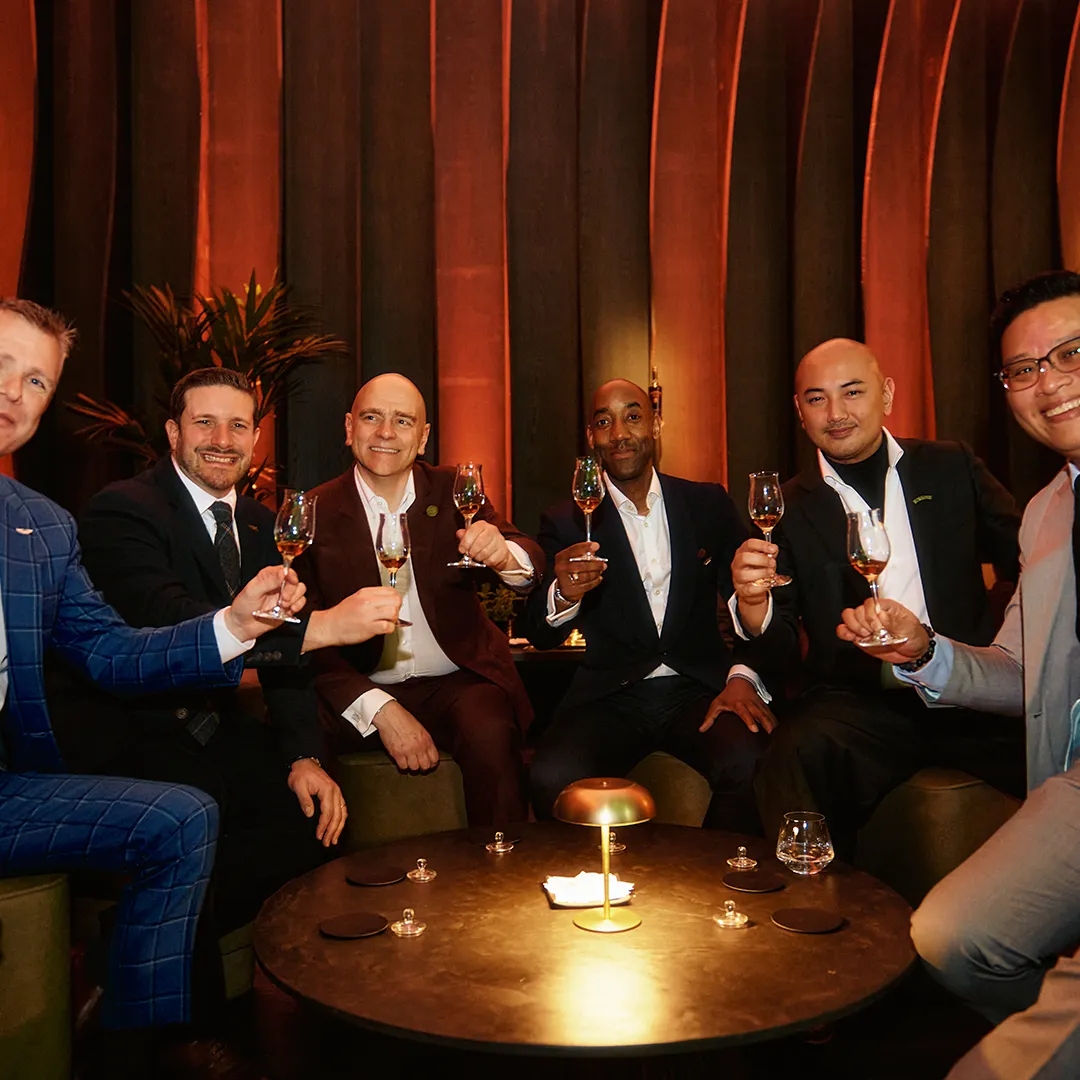 Bowmore brand ambassador Teddy with event attendees