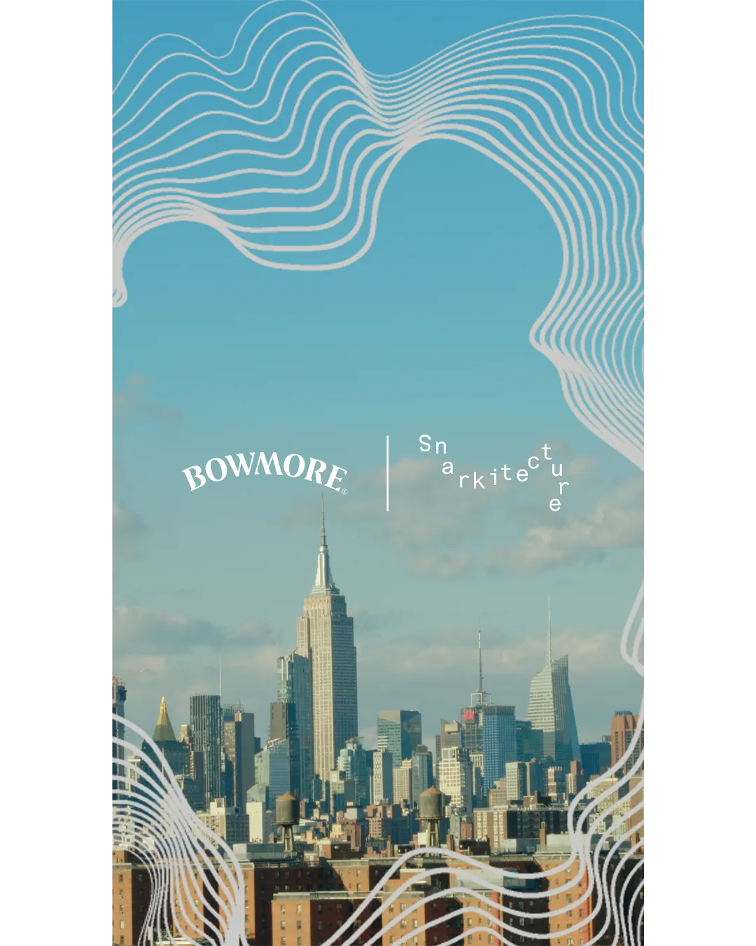 The New York City skyline, with the Empire State Building prominently centered, is shown beneath a blue sky with scattered clouds. White flowing contour lines frame the top and bottom of the image, while the Bowmore and Snarkitecture logos appear near the center, highlighting the collaboration against the city backdrop.
